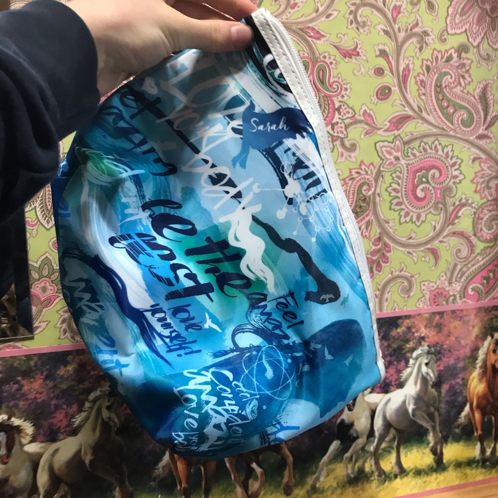 Blue makeup or storage bag